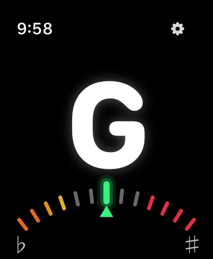 Tuner showing G with a green needle: in tune